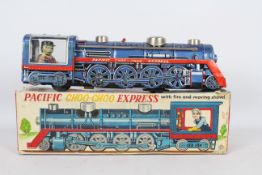 Kanto Toys - A boxed tinplate Pacific Choo-Choo Express train. # 440817.