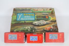 Triang Minic - A boxed Minic M1521 Racing Set with two boxes Minic track pieces and a boxed Minic