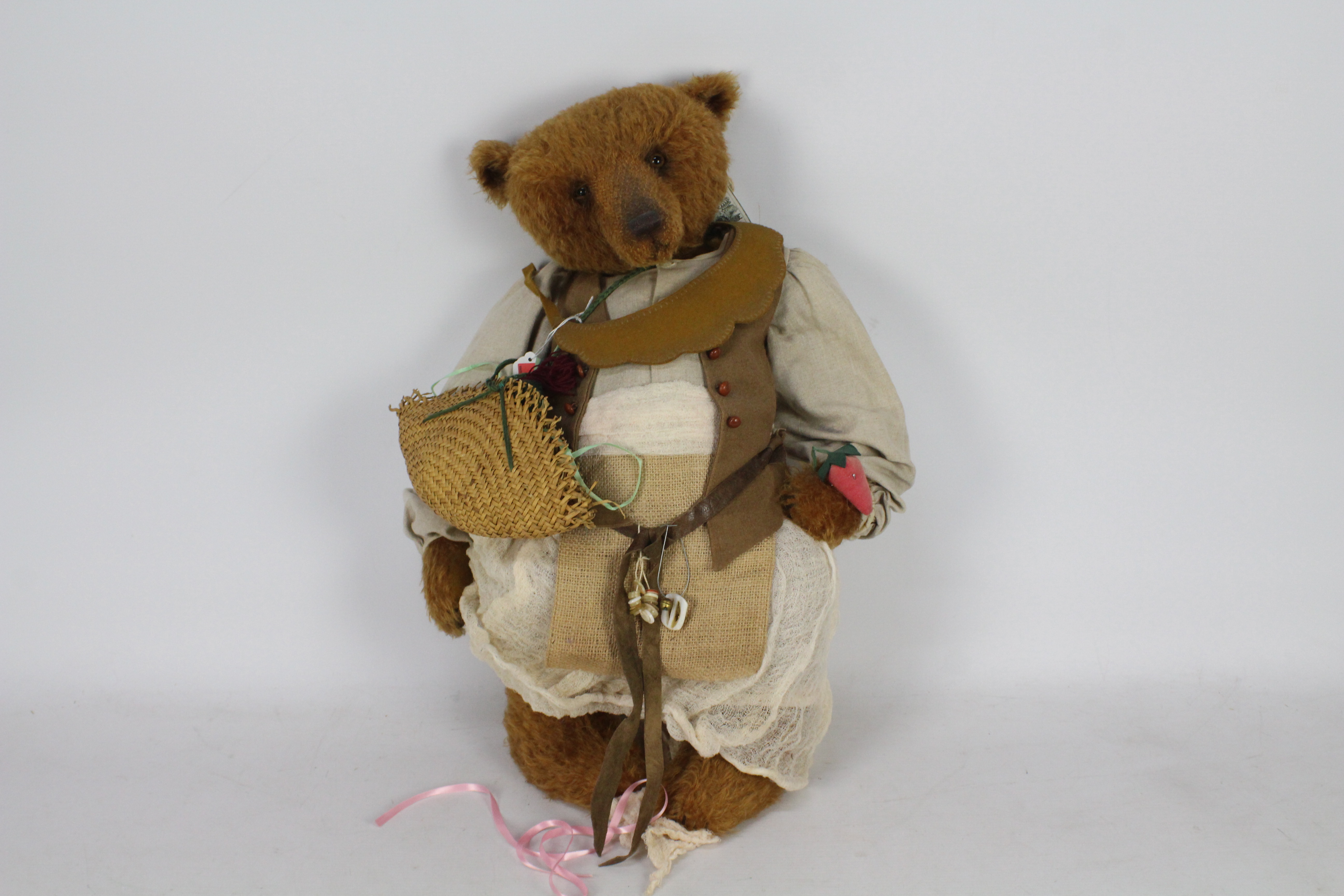 Old Time Teddies - A brown-coloured mohair bear by Kate Berlin. The bear's eyes are glass.