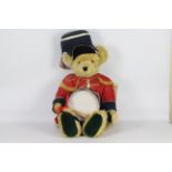 Hermann Bears - A large mohair drummer bear with glass eyes. The bear is a #94 limited edition.