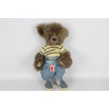 Bears by Pat Morris - A brown-coloured mohair teddy bear with glass eyes.