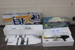 An E-flite Blade 400 3D electric helicopter (no battery or controller) with a Hobby King "pusher"