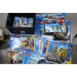 Lego - A collection of over 100 Lego set instruction books and over 30 empty flat packed Lego set