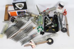 A mixed lot to include a MFA power panel, 7 model aircraft engines some with attached props,