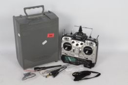 A Futuba FP-T8UP PCM1024 radio control transmitter with 2.4 GHz DM8 8 channel aircraft module.