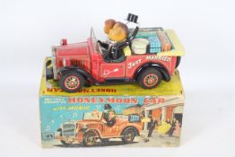 Showa - A boxed vintage Japanese tinplate battery powered Honeymoon Car # 04500.