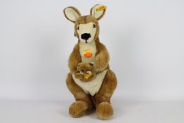 Steiff - An unboxed Steiff #0892/40 Kangaroo 'Kango'. The brown and white plush toy stands approx.