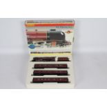 Hornby - a boxed 00 gauge 4-6-2 steam loco set, the Mid Day Scot, with light storage wear.