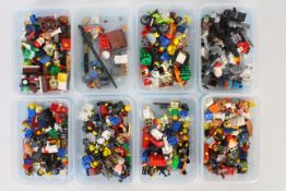 Lego - 8 x tubs of over 100 x Lego figures and accessories including Astronaut, Police,