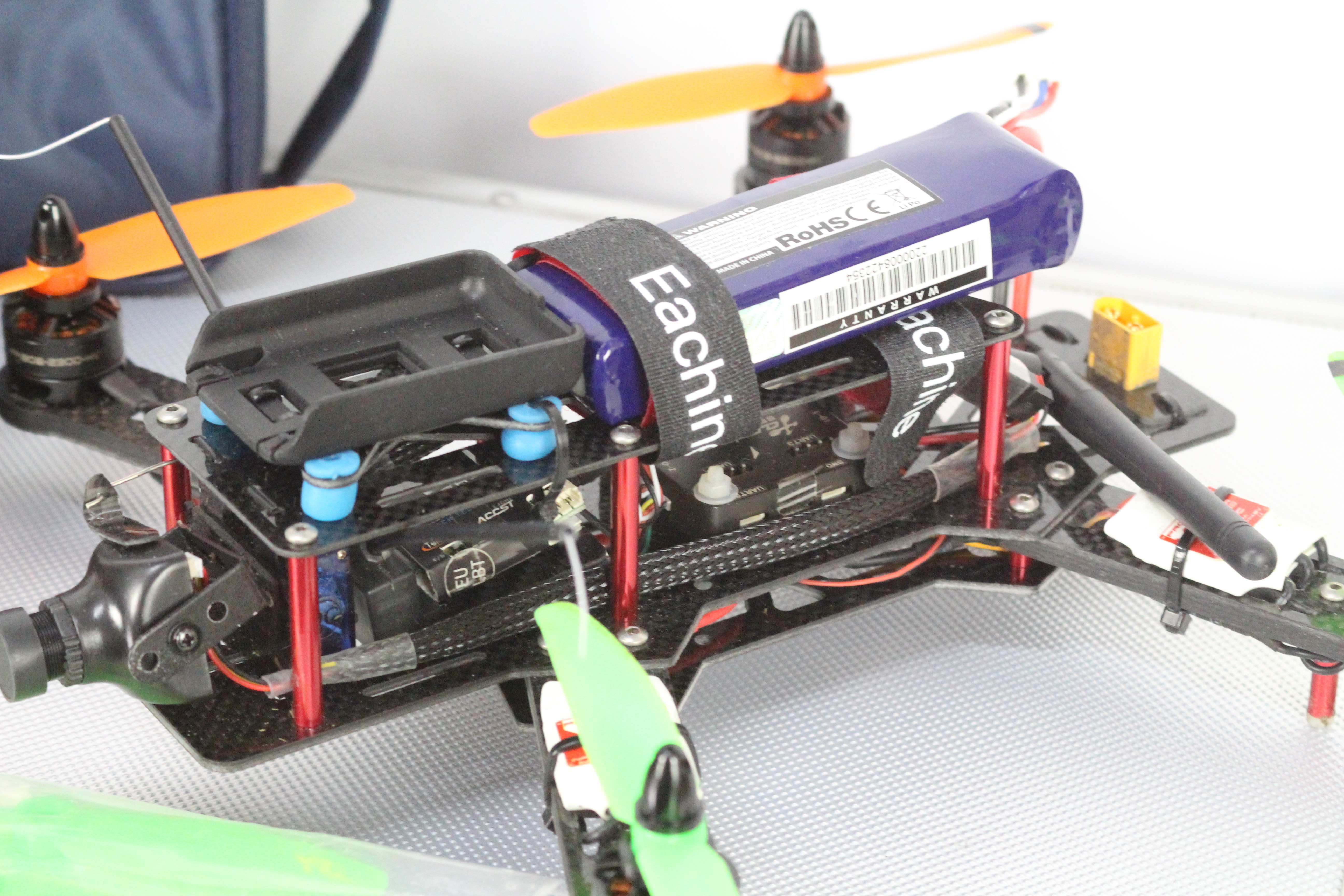 A Eachine carbon fibre drone built from a kit with controllable camera and battery pack. - Image 3 of 5