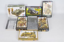 Tamiya - A group of six military vehicle and personnel plastic model kits in various scales.