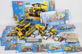 Lego - A collection of 10 x Lego vehicles including # 4202 Dump truck, # 60047 Police car,