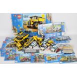 Lego - A collection of 10 x Lego vehicles including # 4202 Dump truck, # 60047 Police car,