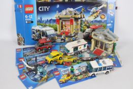 Lego - City museum # 60008 and City car and caravan camping set # 4435.