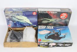 AMT Ertl - A fleet of three boxed AMT 'Star Trek' themed model kits.