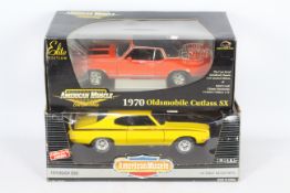 Ertl - Two boxed 1:18 scale diecast 'American Muscle' vehicles by Ertl.