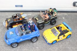 Action Man - A collection of 8 figures and 4 vehicles.