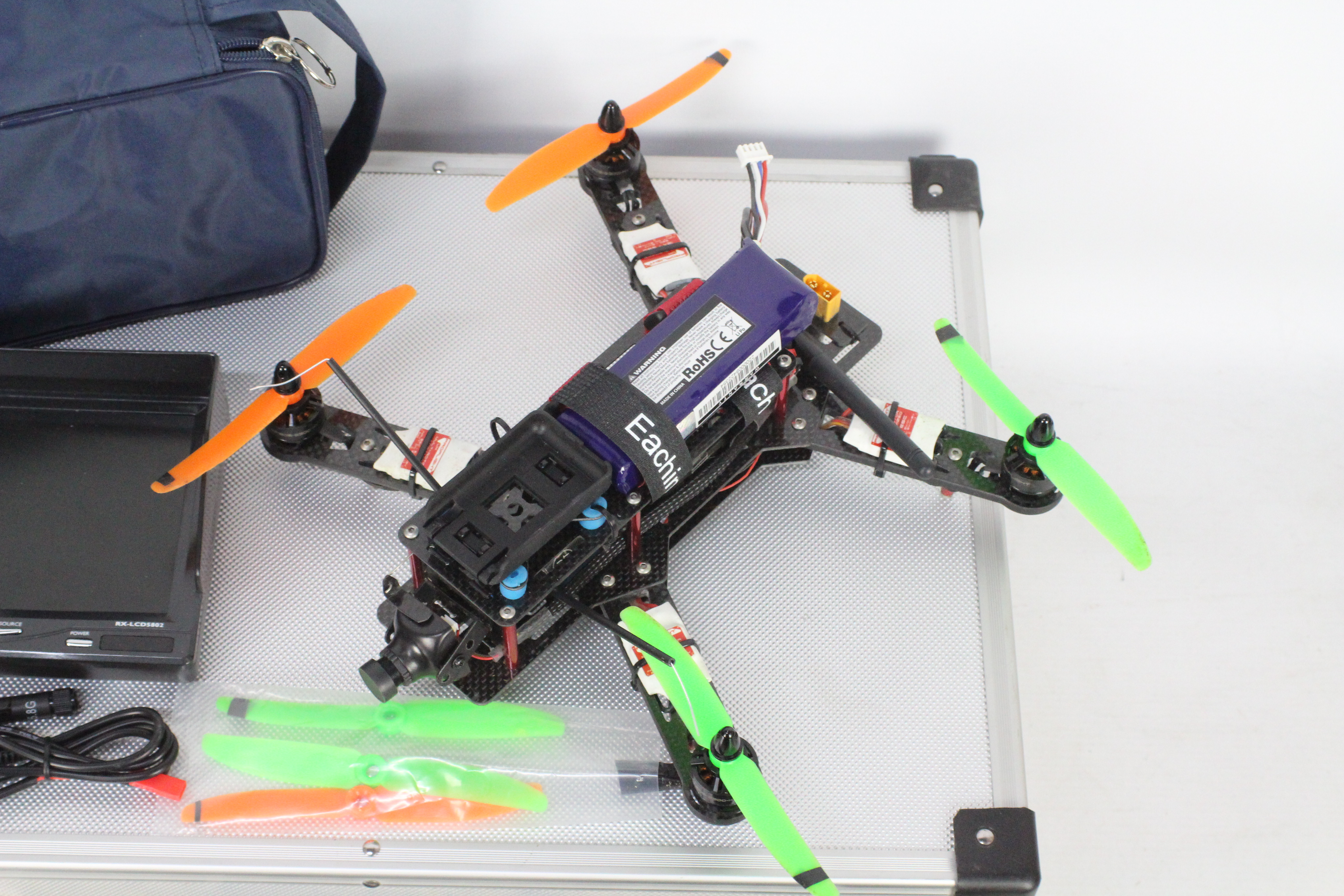 A Eachine carbon fibre drone built from a kit with controllable camera and battery pack. - Image 2 of 5