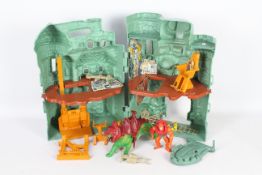MOTU Castle Greyskull (almost complete, string and a few weapons for the rack are missing) Cards,