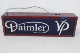 A Daimler VP illuminated lightbox sign, approximately 20 cm x 67 cm.