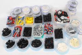 Lego - 35 x tubs of loose Lego parts, some organized by colour, others by shape.