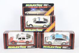 Scalextric - Three boxed Scalextric Rover 3500 slot cars.