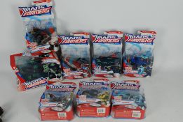 Hasbro, Transformers - A boxed collection of eight Hasbro Transformers 'Animated' figures.