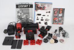 Unimat - An unboxed Unimat 1 model making lathe and accessories plus instruction book.