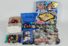 Bakugan - A mixed collection of boxed / carded and loose Bakugan parts and accessories.