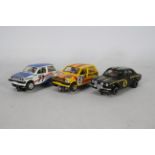 Scalextric - Three unboxed Scalextric rally themed slot cars.