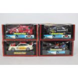 Scalextric - Four boxed Scalextric slot cars.