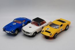 Scalextric - Three unboxed vintage Scalextric slot cars.