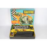 Scalextric - A boxed vintage and hard to find Scalextric V33 'Vintage Motor Racing' Set.