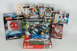 Hasbro, Transformers, Others - A mixed collection of four boxed Hasbro Transformers,