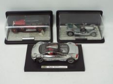 Franklin Mint, Revell - A group of three diecast vehicles in 1:24 and 1:18 scale.