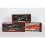 Scalextric - Three boxed Scalextric Ferrari slot cars.