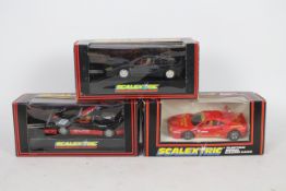 Scalextric - Three boxed Scalextric Ferrari slot cars.