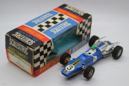 Scalextric - A boxed vintage Scalextric 1969-72 'Race Tuned' C14 Matra GP, in blue with RN3,