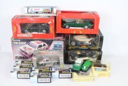 A collection of 17 die cast cars including BBurago, Tonka and Revell.