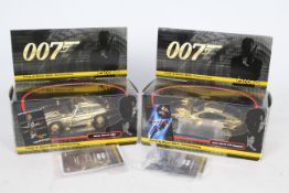 Corgi - James Bond - 2 x boxed 40th Anniversary Gold edition Aston Martin models,