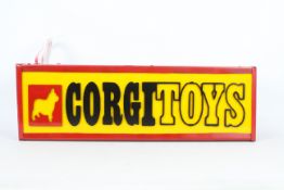 Hand painted, brushed steel, advertising light box marked Corgi Toys,