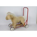 Tri-ang - Rovex - A vintage Pedigree Soft Toy push along ride on horse toy.