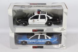 UT Models - Two boxed 1:18 scale UT Models UT0597 Chevrolet Caprice US police cars in Los Angles