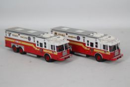 Code 3 Collectibles - 2 x unboxed limited edition 1996 HME/Saulsbury Heavy Rescue Fire Trucks in