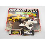 Scalextric - 2 x boxed cars and a boxed Grand Prix set.