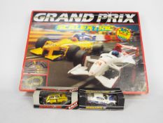 Scalextric - 2 x boxed cars and a boxed Grand Prix set.