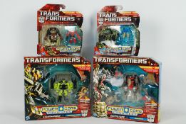 Hasbro, Transformers - Four boxed / carded Transformers 'Power-Core Combiners' action figures.