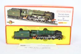 Hornby - A boxed OO gauge 2-10-0 loco named Evening Star in BR dark green operating number 92220.
