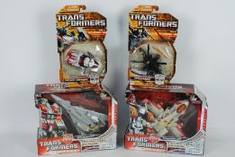 Hasbro, Transformers - Four boxed Hasbro Transformers figures.