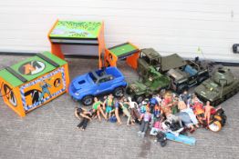 A large collection of Action Man - Barbie - Thunderbirds - Action Man vehicles - Action Man Wooden